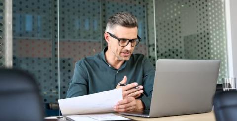 A professional negotiating confidently at work, seeking guidance on requesting a salary increase.