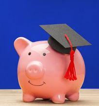 A piggy bank wearing a graduation cap, symbolizing financial planning for postgraduate education.